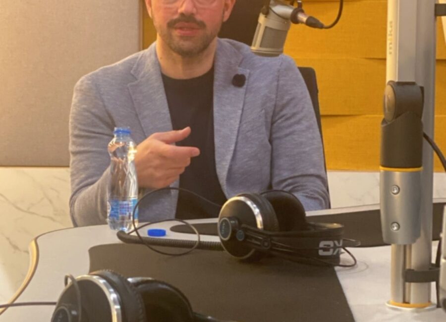 Dr. Mahmoud Anous during a radio interview