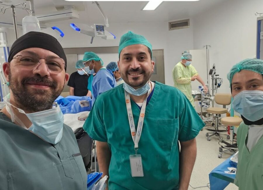 Dr. Mahmoud Anous with the operating-room team